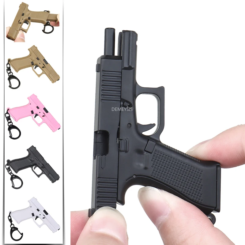 Home Decor Magazine - Mini pistolas forma chaveiro modelo realista